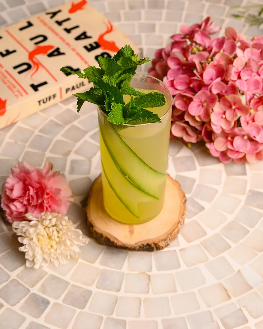 A cucumber and mint cooler among pink hydrangeas
